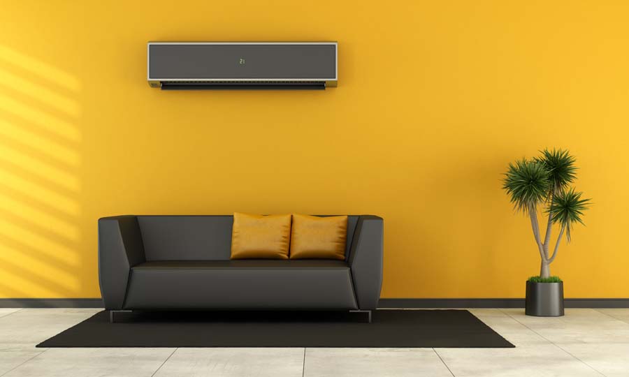 Modern living room with black couch and air conditioner on wall as a 3d rendering.
