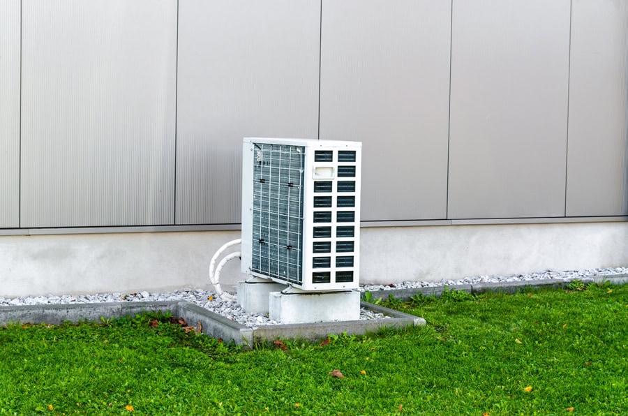 Mounted air conditioner outside home in Marlborough, MA.