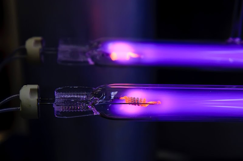 Two UV lamps turned on to improve indoor air quality.